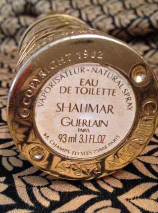 Vaporisateur Guerlain en métal doré