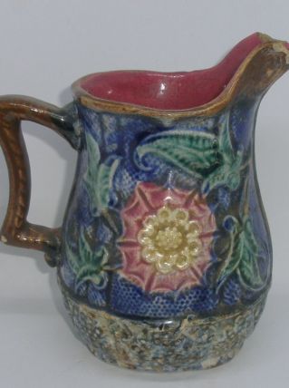 Cruche en barbotine de 1890