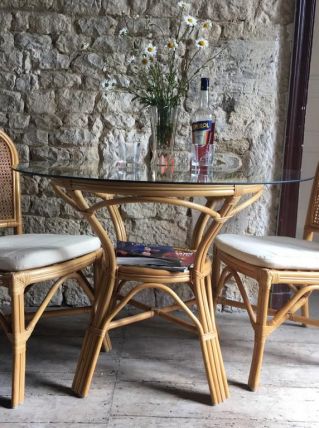Table en rotin et dessus de verre + 4 chaises