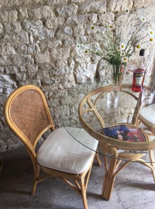 Table en rotin et dessus de verre + 4 chaises