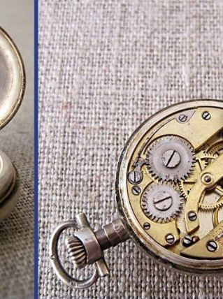 petite montre à gousset de femme en métal argenté poinçonné 