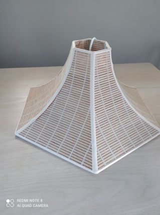 Plafonnier année 70-80 en bois en très bon état