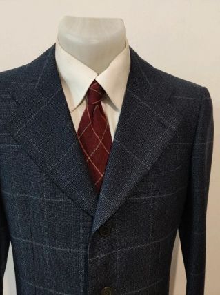 Gentil veste bleu gris a carreaux