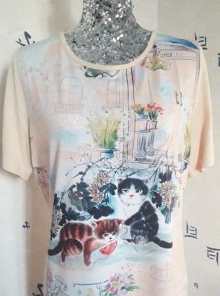 Magnifique tee-shirt imprimé très doux 95% viscose taille 42
