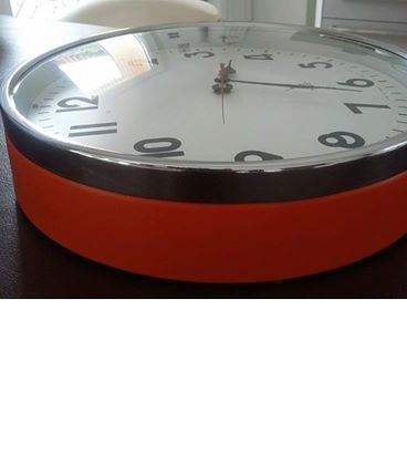 Horloge "JAZ" orange années 70