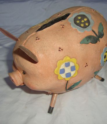 Tirelire cochon et fleurs