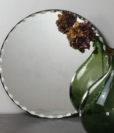 Beau miroir rond biseauté des années 30