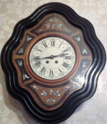 Horloge  Oeil de boeuf second empire