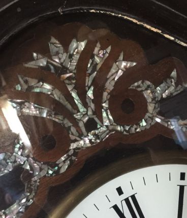 Horloge œil de bœuf 