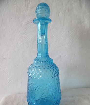 bouteille ancienne en verre bleu