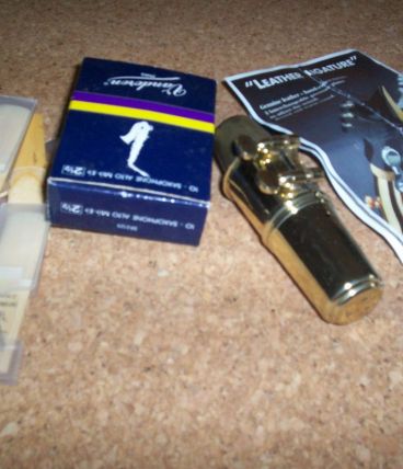 EMBOUT DE SAXOPHONE HENRI SELMER + ligature 