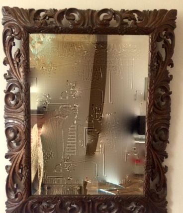 Miroir en bois sculpté vintage