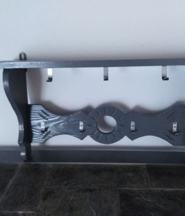 Porte-manteaux mural en bois sculpté 