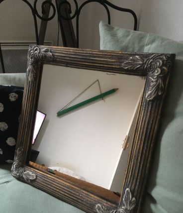 Miroir en bois sculpté 