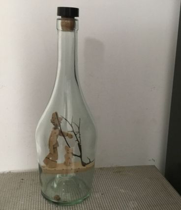 Bouteille avec personnage en liège 