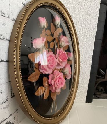 Cadre avec fleurs sous verre