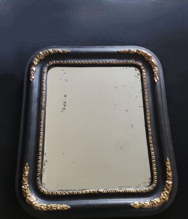 miroir ancien en bois noir et doré