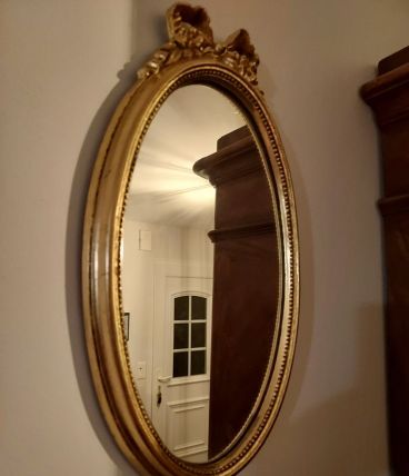 Miroir médaillon doré style Louis XVI