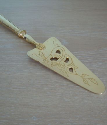 Pelle à tarte métal doré marque Priviloège