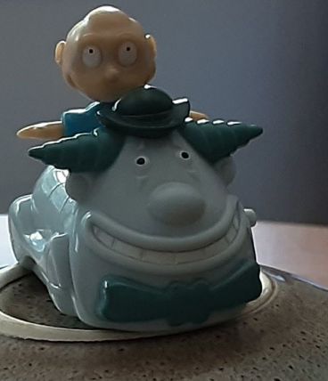 Figurine Casse bonbon dans son porteur 