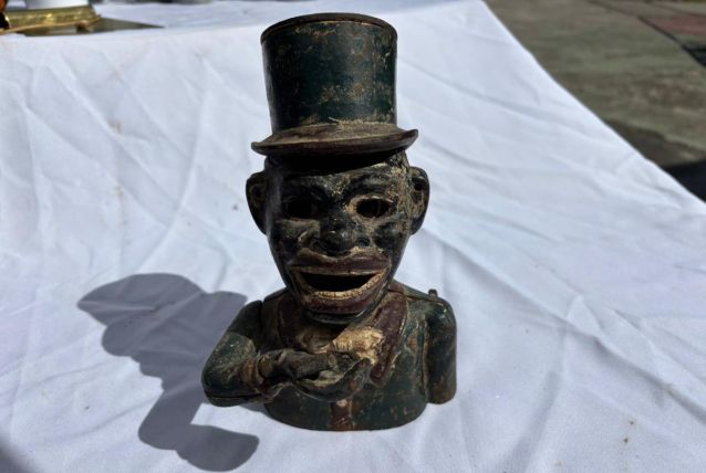 Tirelire mécanique fonte