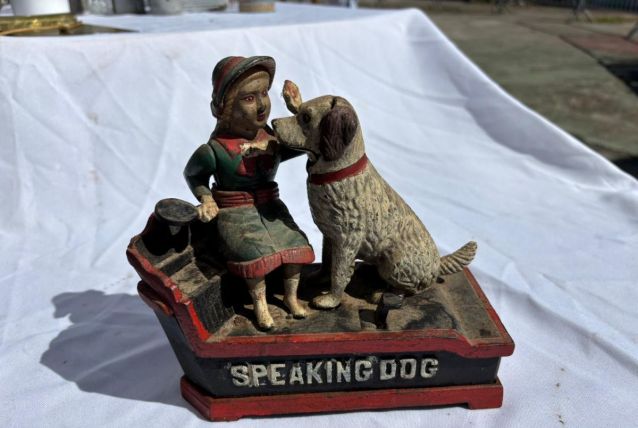 Tirelire mécanique en fonte