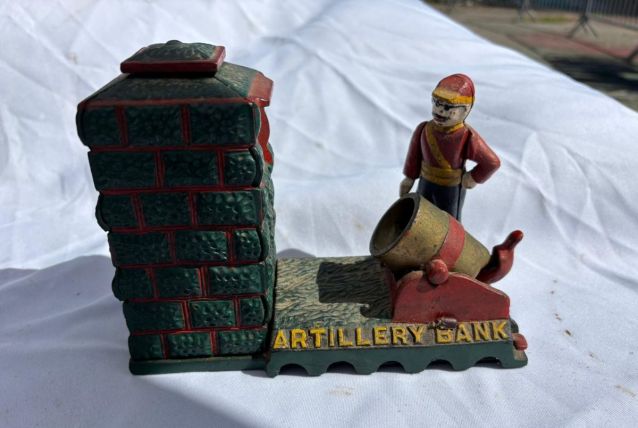 Tirelire automate en fonte